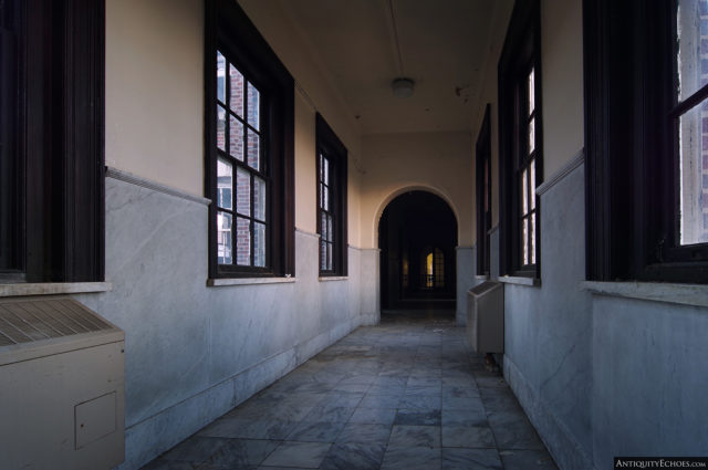 A brightly-lit hallway in the Allentown State Hospital