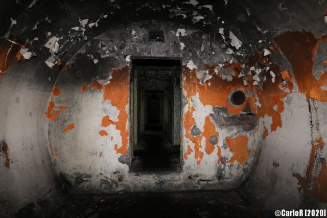 Remnants of orange paint peeling off Tuman bunker. (Photo Credit: CarloR)