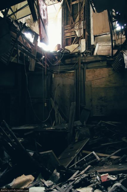 Gapping hole where a floor has given way to years of decay