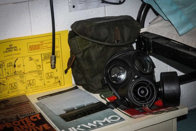 Gas mask placed atop a side table