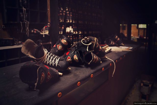 Pile of roller skates on a counter