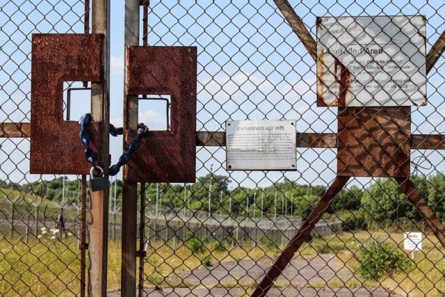 Chainlink gate with a padlock keeping it closed