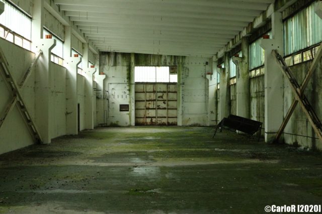 Empty room lit by upper windows