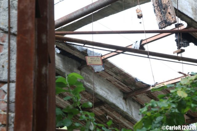 View of a collapsed roof from the ground