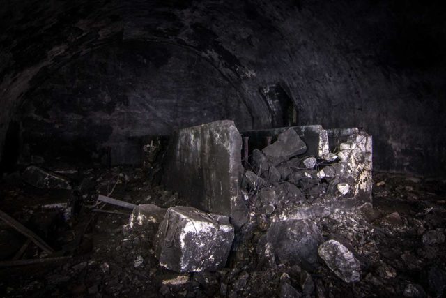 Piles of cement and rubble within Željava Airbase