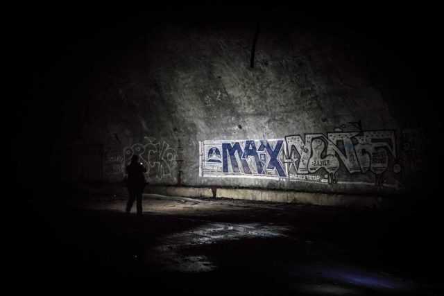 Graffiti on an interior wall at Željava Airbase