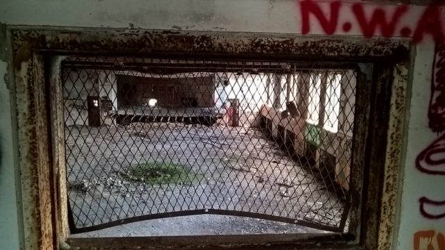 View of a room through a gated window