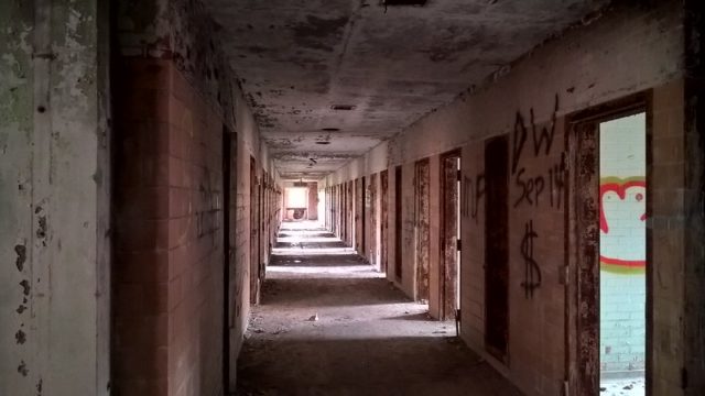 Dimly lit hallway within the Burwash Correctional Center