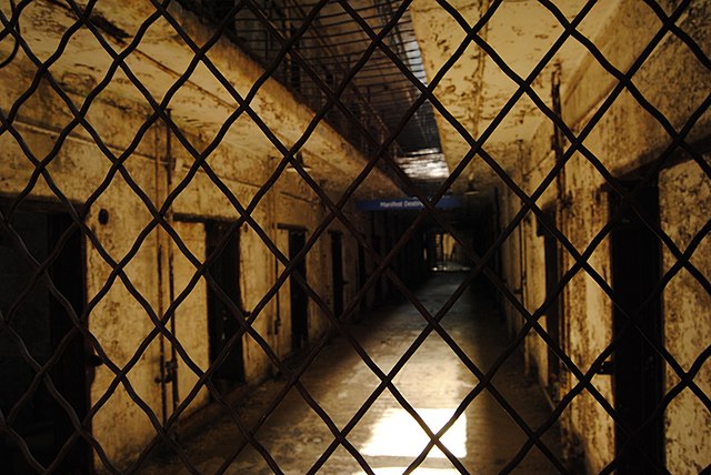 View of a hallway through a gated window