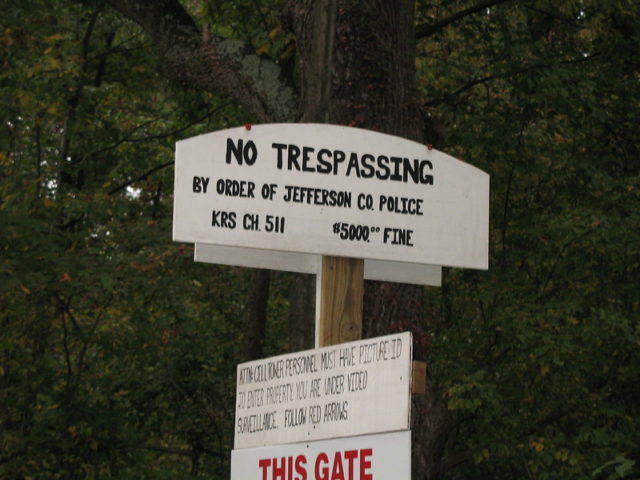 "No Trespassing" sign outside of Waverly Hills Sanatorium