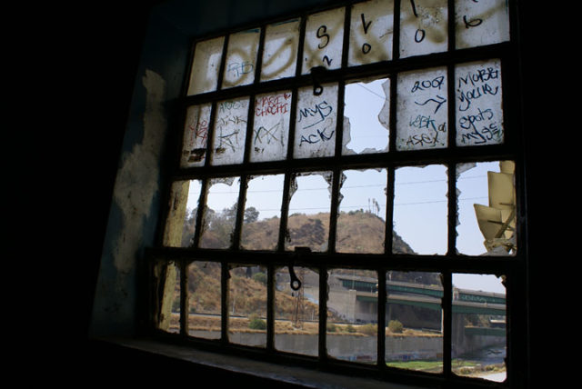 Looking outside from a broken window at the Lincoln Heights Jail