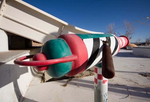 Waterpark accessory attached to the roof of a building