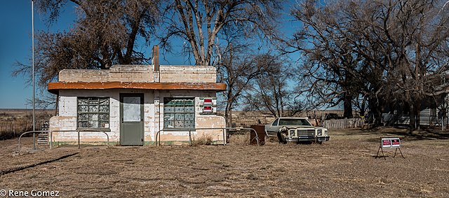 Vintage car parked beside the Little Juarez Café