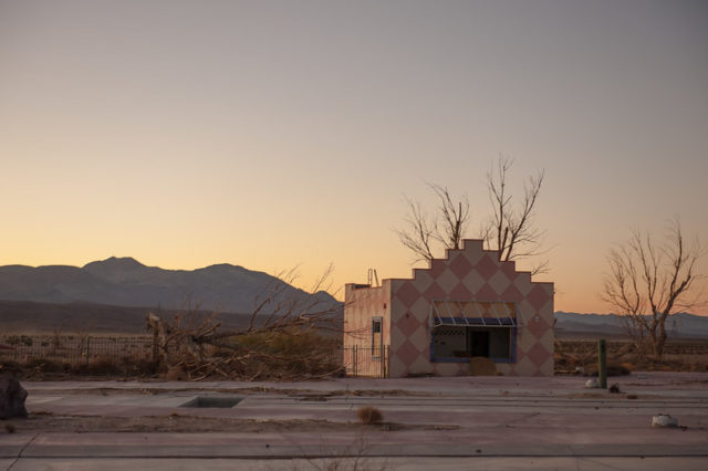 Pink and white checkered building in the sunset