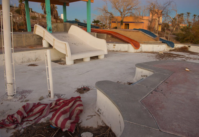 Children's waterslide and an empty pool at Rock-A-Hoola Waterpark