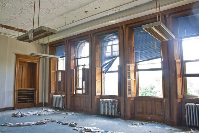 Large room brightly-lit with windows