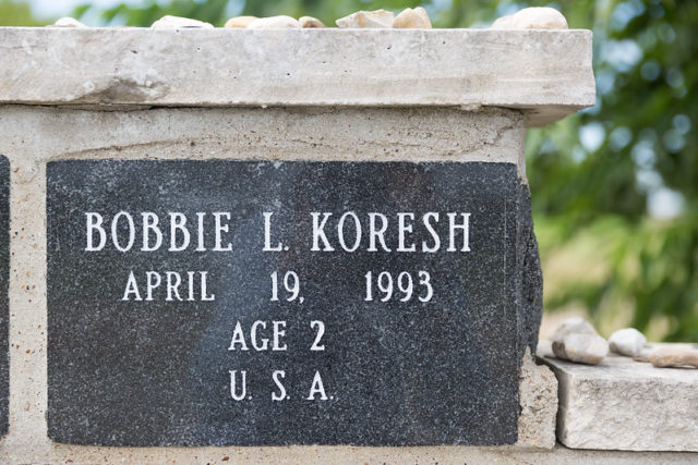 Black brick with Bobbie K. Koresh's name, age and date of death