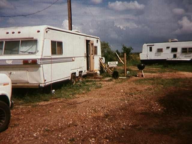 Trailers along a dirt road