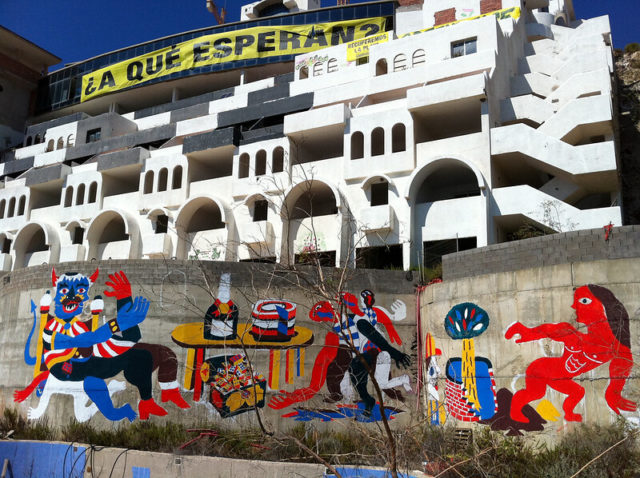 Graffiti on an exterior cement wall of the Algarrobico Hotel