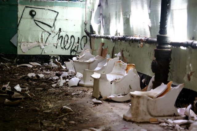 Row of broken toilets