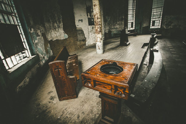 Church furniture scattered around the room