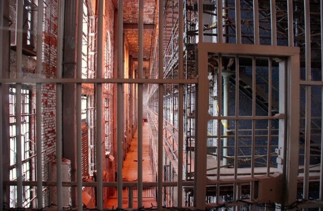 View through the bars of a jail cell