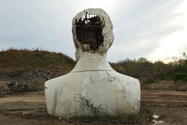 Back of one of the presidential busts from Presidents Park