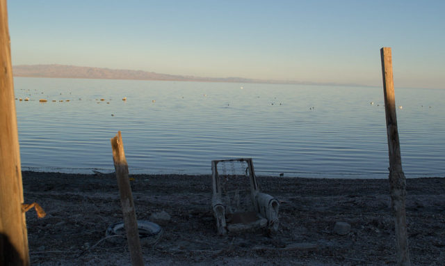 Abandoned chair on Salton Sea beach 