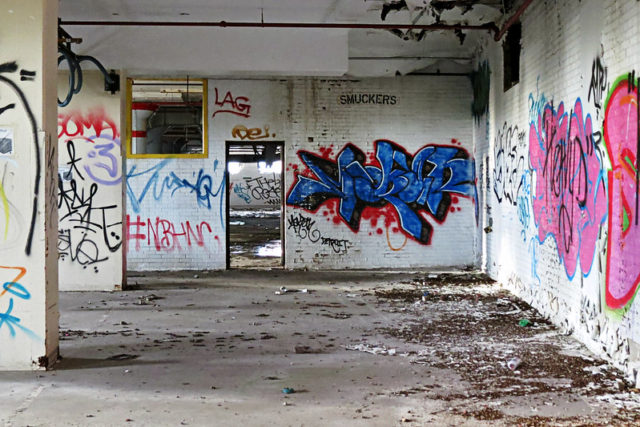 Graffiti-covered walls at Brach's Candy Factory