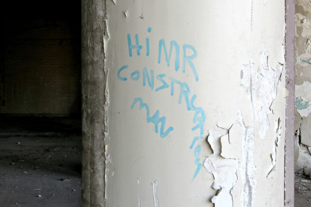 Graffiti-covered cement pillar