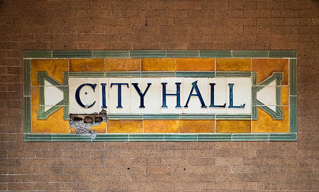 Plaque reading "CITY HALL"