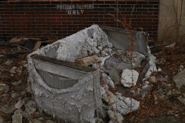 Ripped couch outside of the Packard Automotive Plant