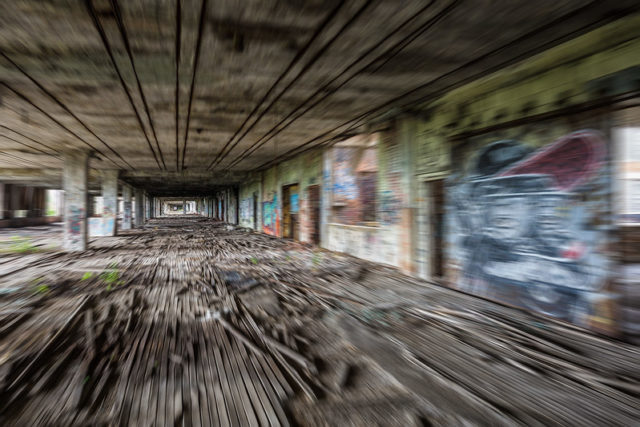 Blurry view of a graffiti-covered room
