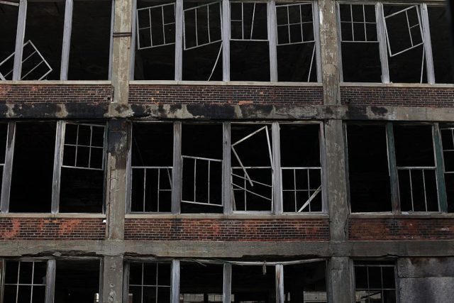 Rows of broken windows at the Packard Automotive Plant