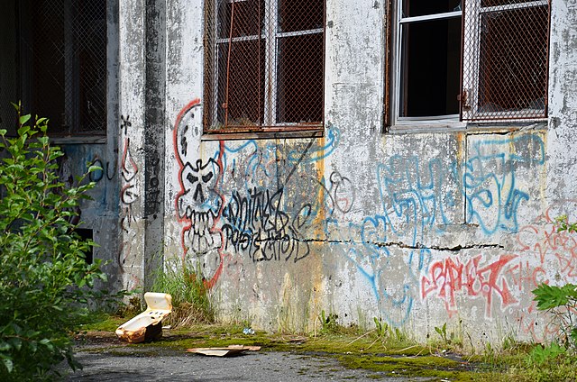 Graffiti-covered exterior wall of the Buckner Building