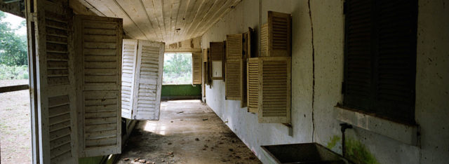 Window shutters open in a home's interior