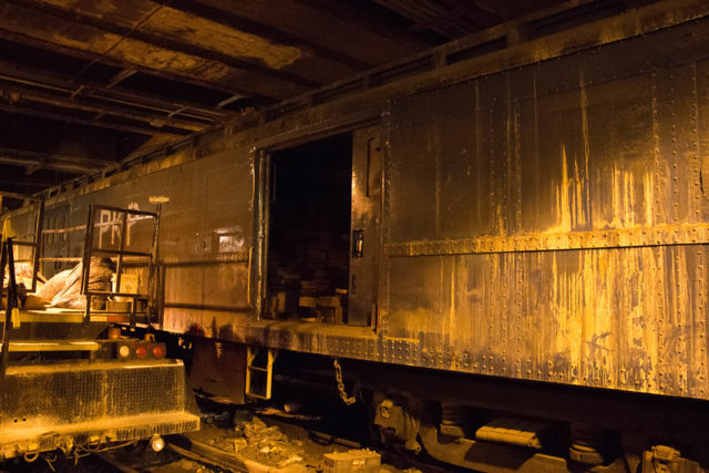 Train car shrouded in darkness at Track 61