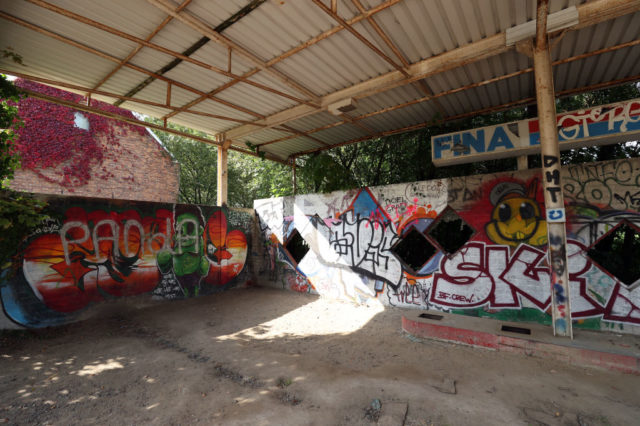 Graffiti-covered interior of a building