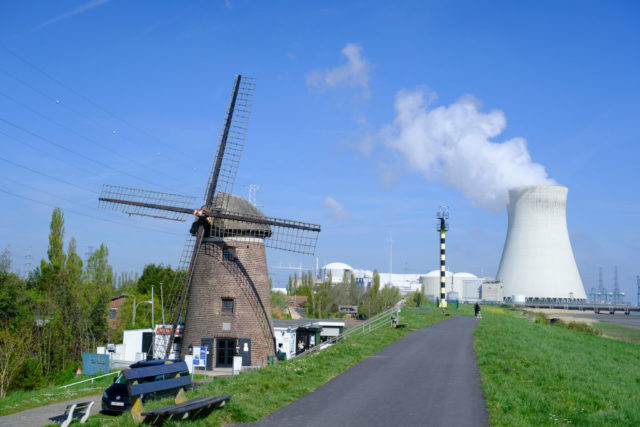 Windmill with the Doel Nuclear Power Station in the background
