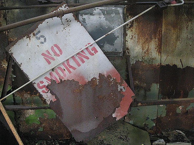 Rusty "NO SMOKING" sign