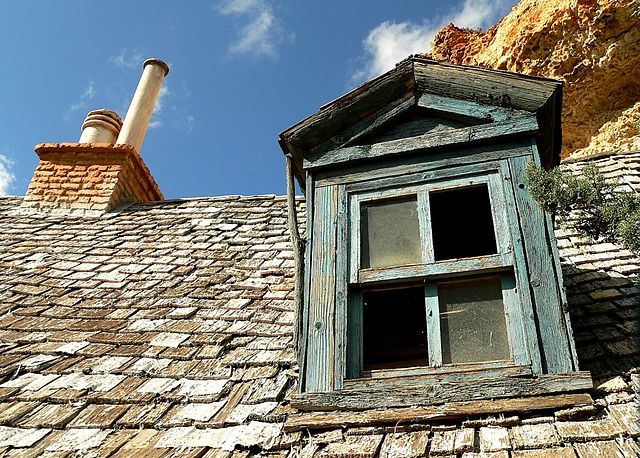 View of a window sticking out of a roof