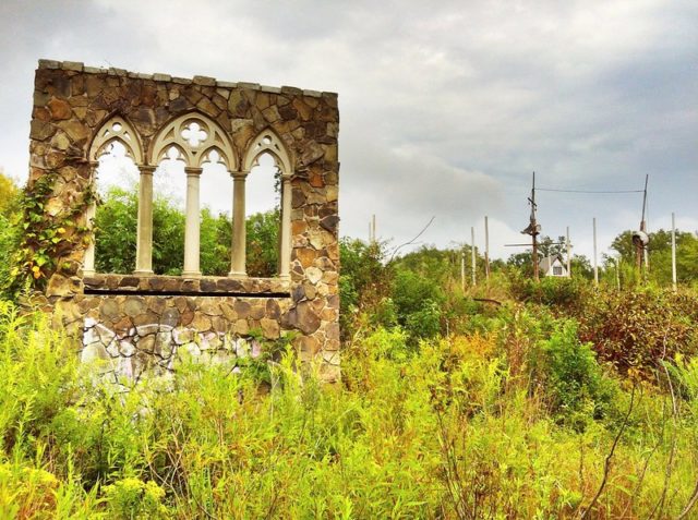 Medieval-style Wall in the middle of tall grass