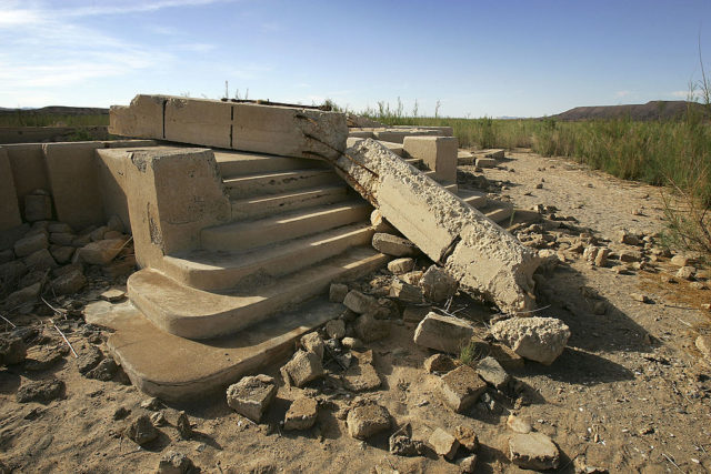 Concrete stairs in the rubble of an old school