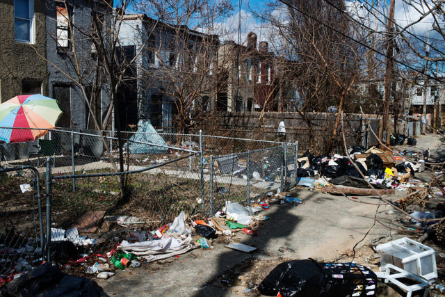 Garbage littering a residential street