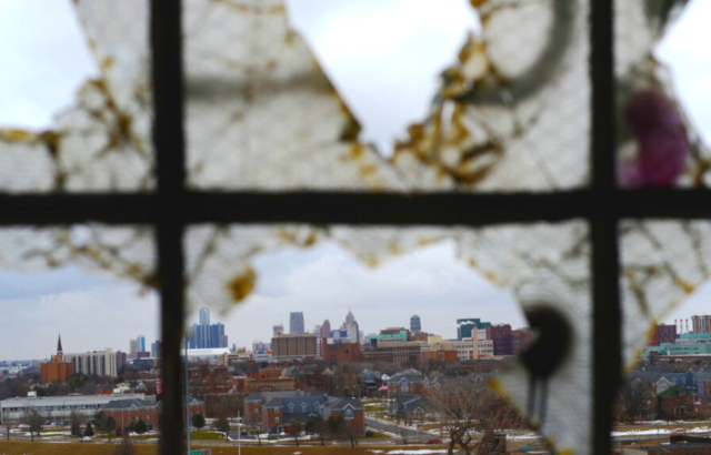 Looking out at Detroit through a broken window