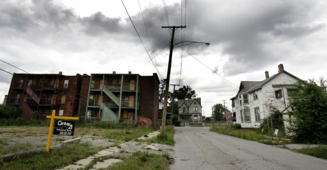 Old house and apartment building on a Detroit street