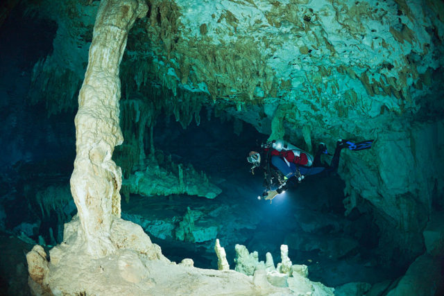 Scuba diver in cenote