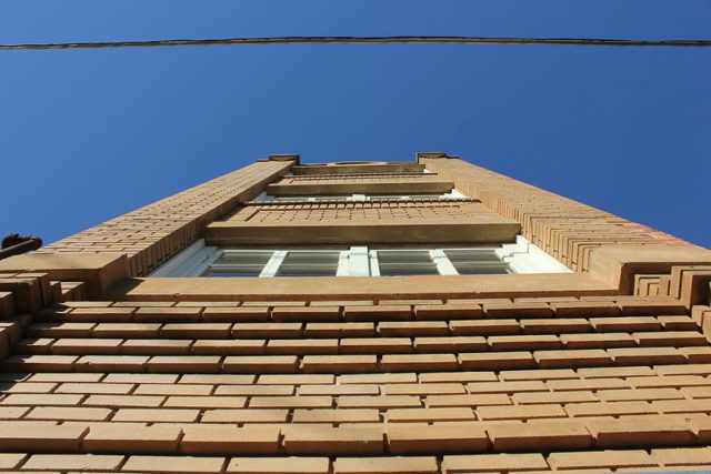 Looking up the exterior of the Newby-McMahon Building