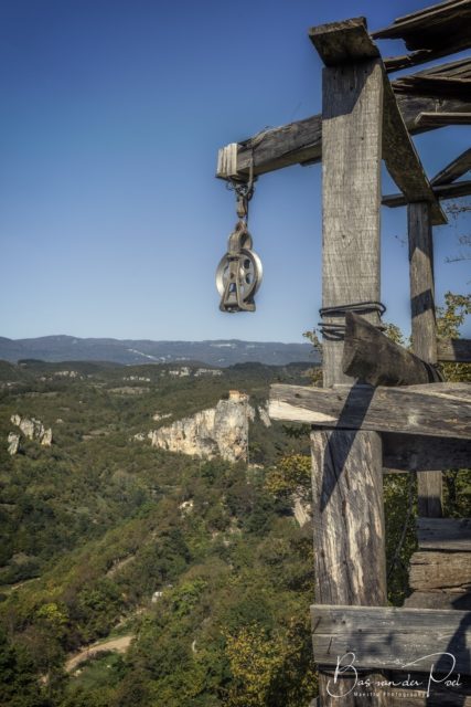 Metal circle hanging off the edge of a wooden structure in Abkhazia