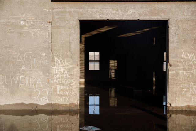 Exterior of a building covered in etchings